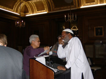 Professor James Jones speaks with an audience member at the Understanding
Islam Focus Seminar that took place January 31, 2006 at Manhattanville
College.